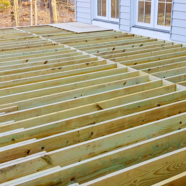 Fragment planks installing wood floor for patio deck with new wooden decking